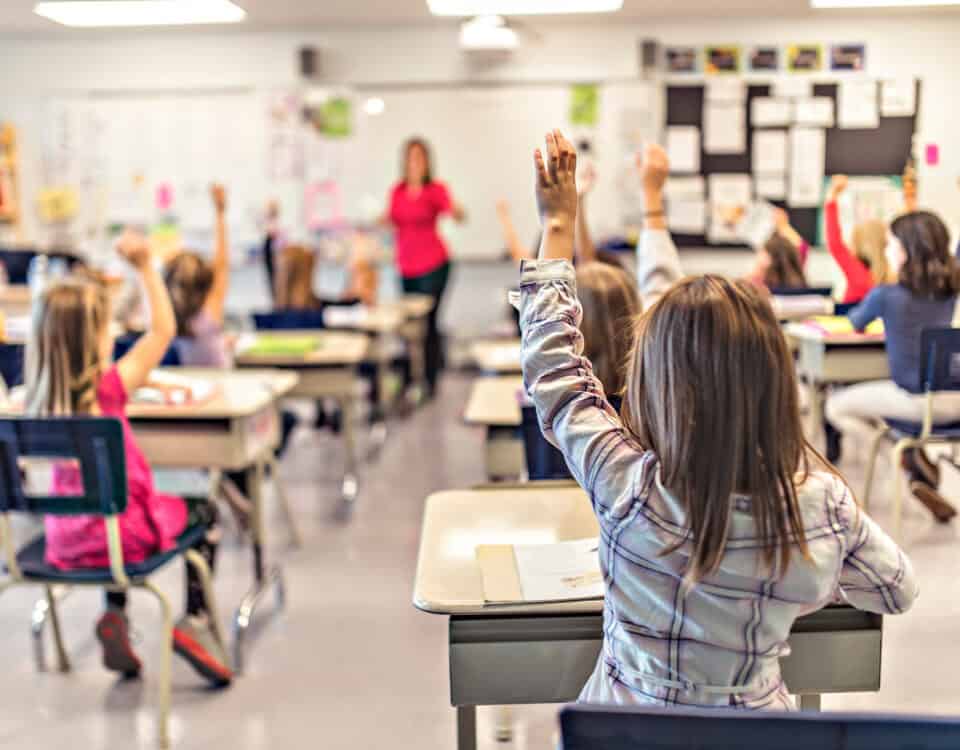 A classroom filled with pupils and a teacher